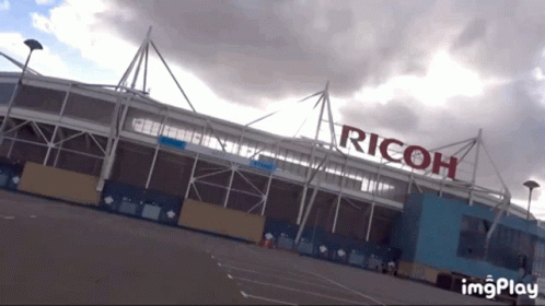 Large Building With Ricoh GIF