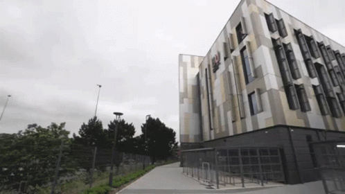 Large Building with Windows and Fence