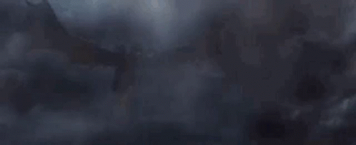 Large Dragon Flying Through Foggy Sky
