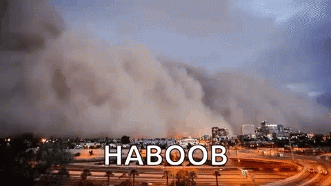 Large Dust Cloud Blowing Over City Haboob GIF