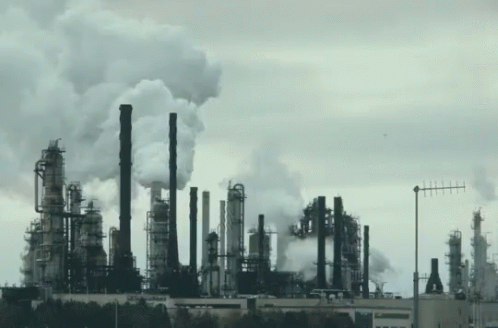 Large Factory With Smoking Chimneys GIF