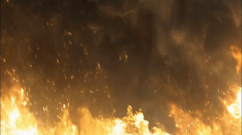 Large Fire Burning in Dark Night Sky