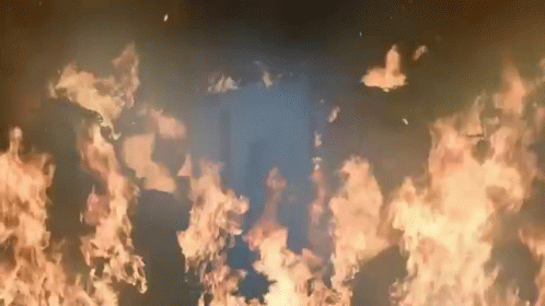 Large Fire Burning In The Sky At Night GIF
