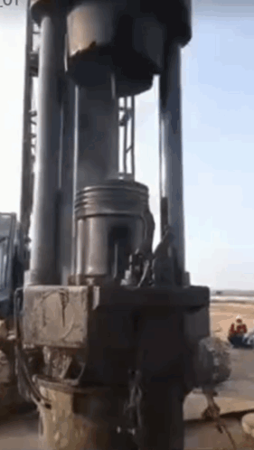 Large Machine on Rocks in Field