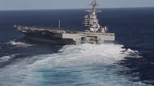 Large Military Ship USS Floating in Ocean
