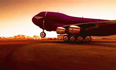 Large Purple Airplane Taking Off GIF