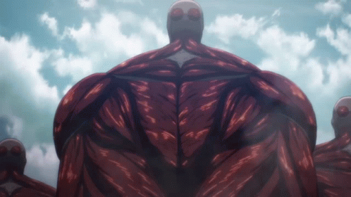 Large Red Monster With White Head Against Blue Sky
