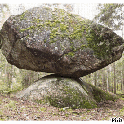 Large Rock on Smaller Rock in Woods
