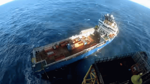 Large Ship With Containers Floating In Ocean GIF