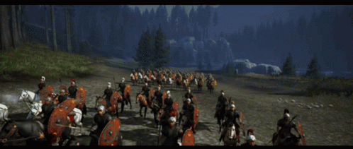 Large Soldiers Riding Horses With Shields GIF