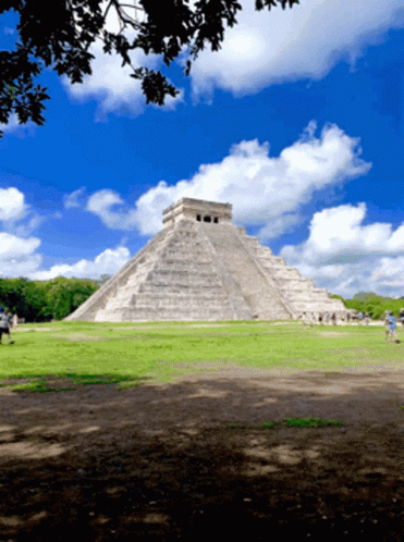 Large Stone Pyramid Blue Sky White Clouds
