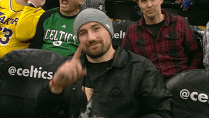 Larry Bird Fan Showing Shirt GIF