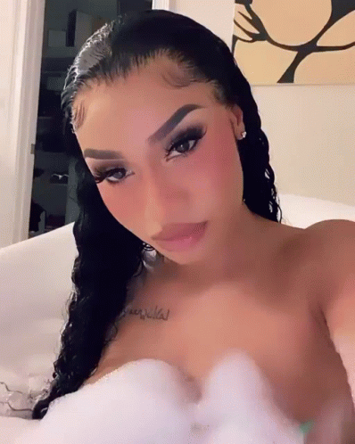 Latto Posing On Her Phone's Camera GIF