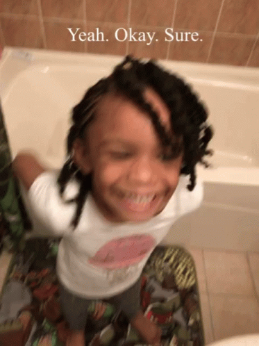 Laughing Kid Says Okay Sure GIF