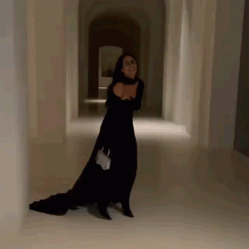 Laughing Kim K In A Black Dress GIF