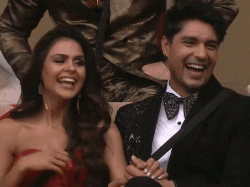 Laughing Man in Tuxedo and Woman in Red
