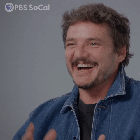 Laughing Pedro Pascal Eating Sandwich GIF