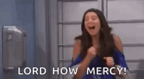 Laughing Woman Holding Fist Lord How Mercy