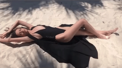 Lay Down On Sand GIF