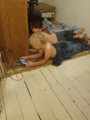 Lay Down Playing Phone GIF