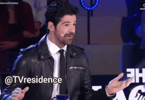 Leather Jacket Man With Tie Talking Into Mic @Tvresidence GIF