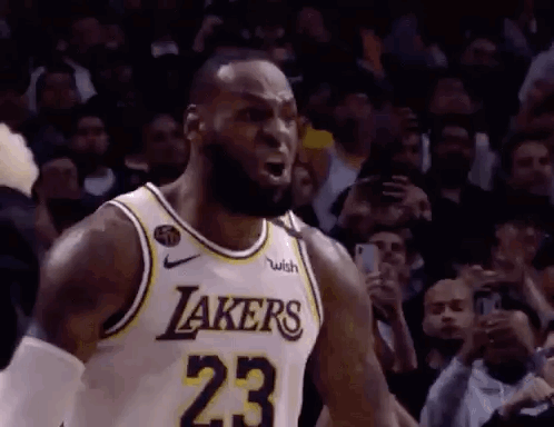 Lebron James Is Wearing A Lakers Jersey And Shouting At The Crowd . GIF
