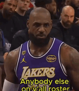 Lebron James Is Wearing A Lakers Jersey And Talking To The Crowd . GIF