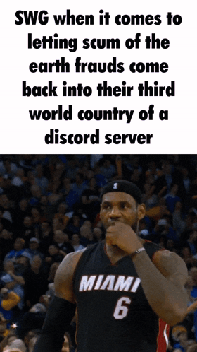 lebron james is wearing a miami 6 jersey and covering his mouth