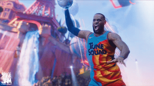 Lebron James Is Wearing A Tune Squad Jersey And Holding A Basketball GIF