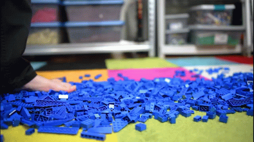 Stepping On Blue Lego GIF