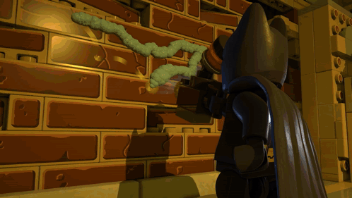 Lego Batman Standing Next to Brick Wall