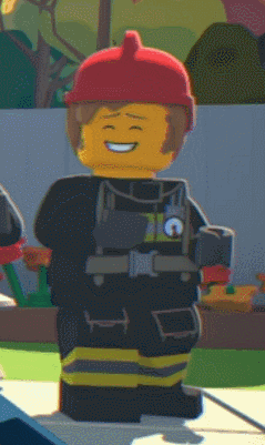 Lego Fireman Smiling in Red Helmet and Vest