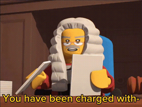 Lego Judge Holding Charge Paper
