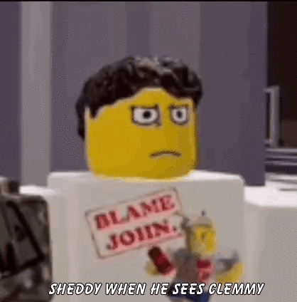 Lego Man Wearing Blame Join Shirt