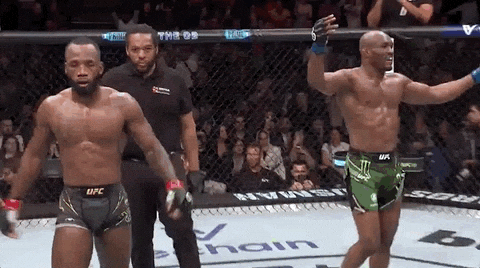 Leon Edwards Arms Up Approaching Camera GIF