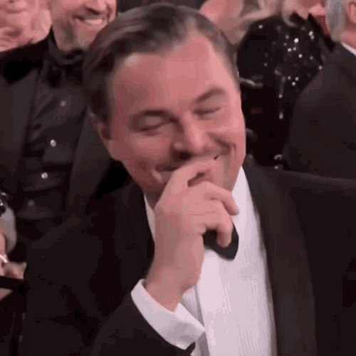 Leonardo DiCaprio Shy Laughing GIF