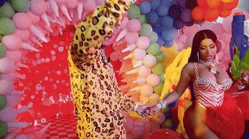 Leopard Print Man and Zebra Print Woman Holding Hands