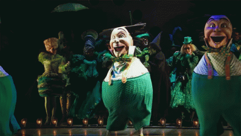 Leprechauns Dancing On Stage GIF