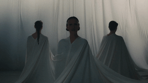 Let There Be Light Ladies Wearing White Fabrics GIF