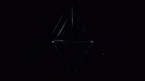 Letter W On Black Background With Stars GIF