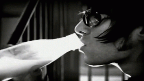 Liam Gallagher Drinking From Bottle GIF