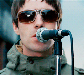Liam Gallagher With Microphone Close Shot GIF