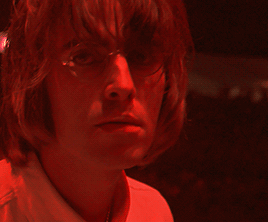 Liam Gallagher With Red Lighting GIF