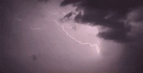 Lightning Bolt Shining Through Clouds GIF