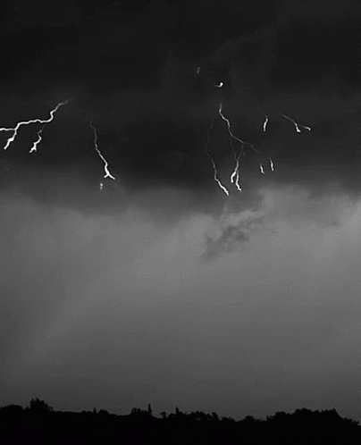 Lightning Strikes Dark Cloudy Sky GIF