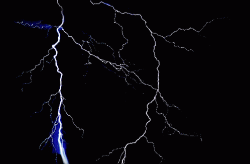 Lightning Strikes In A Dark Sky With A White Light Coming Out Of The Center GIF