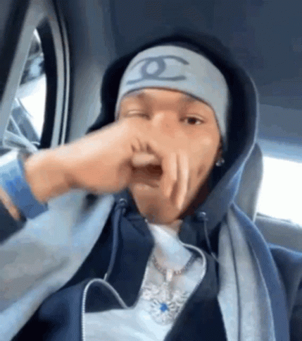 Lil Baby Rapping Mouth Covered GIF