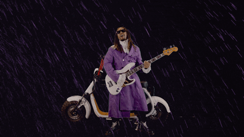 Lil Jon Playing Guitar While Raining GIF