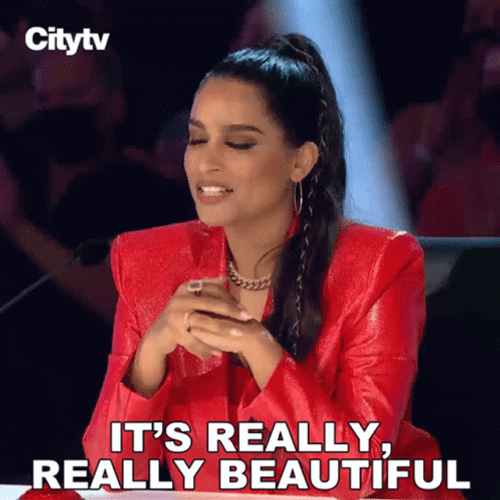Lilly Singh In Red Suit It's Really Beautiful GIF