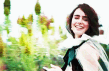 Lily Collins Waving Goodbye GIF